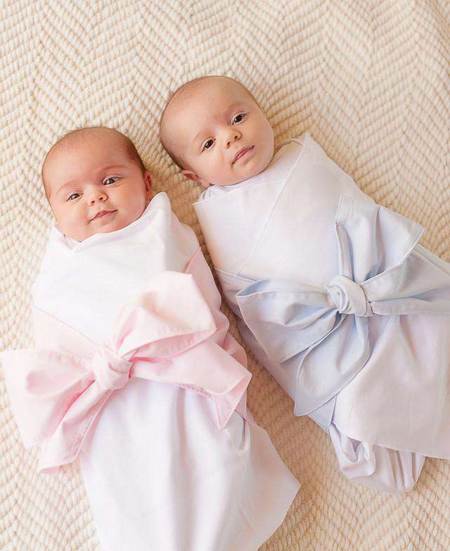 Swaddle blanket and outlet bow