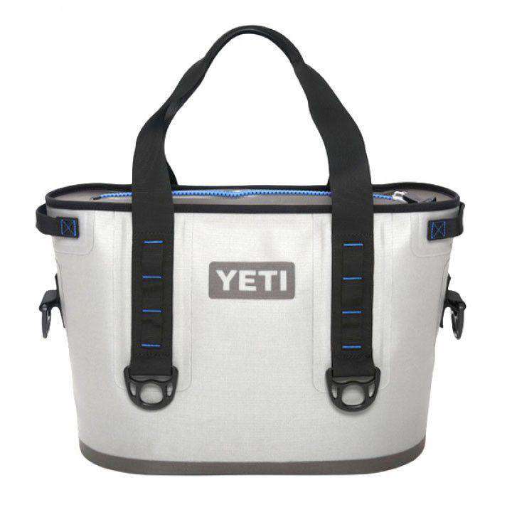https://www.countryclubprep.com/cdn/shop/products/coolers-hopper-20-in-fog-gray-and-tahoe-blue-by-yeti-1.jpg?v=1578520102